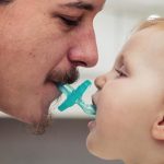 Sucking on your kid’s pacifier is Good
